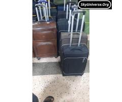 Leather and plastic suitcase