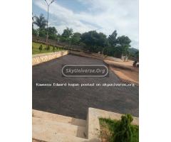 TARMACKING ROADS AND COMPOUND