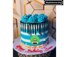 Birthday cake with the chocolate drippings
