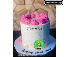 White and pink flowers birthday cake