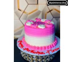 Pink and white birthday cake