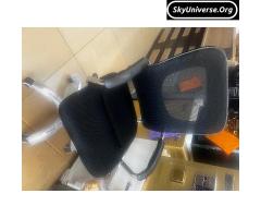 Swivel chair , meshed back
