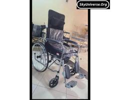 Heavy duty stainless wheelchair with backrest and potty and footrests