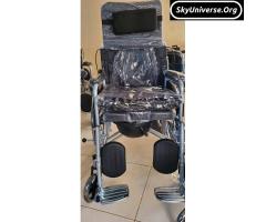 Heavy duty wheelchair with backrest and potty with footrests